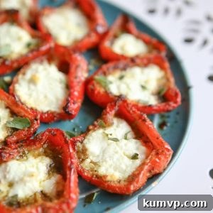 Roasted Red Peppers with Pesto and Goat Cheese, a flavorful and simple dish.