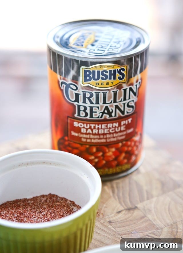 Grilled Pork Chops smothered in a special sauce made with baked beans, peppers and onions. So flavorful and an easy dinner to make - perfect for grilling season!