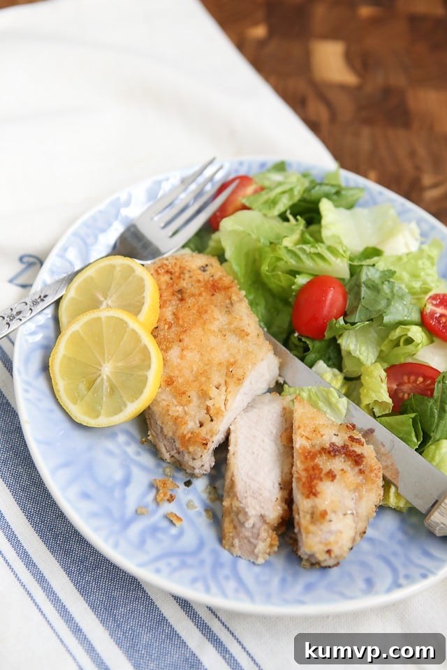 Crispy Parmesan Baked Pork Chops 3 Close-up of golden-brown Parmesan Baked Pork Chops