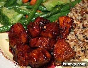 Bourbon Glazed Chicken Feast 4 Delicious Bourbon Chicken served with rice and vegetables