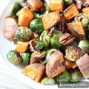 All the flavors of fall on a plate! Drizzled with a maple, balsamic and sriracha glaze....you'll love these Roasted Sweet Potatoes and Brussels Sprouts with Pecans