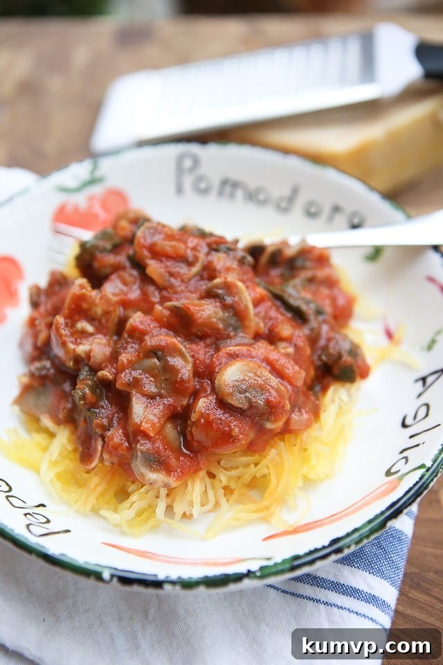 Spaghetti Squash with Sausage and Mushroom Bolognese Spaghetti Squash with Sausage and Mushroom Bolognese is a hearty low carb meal full of flavor!