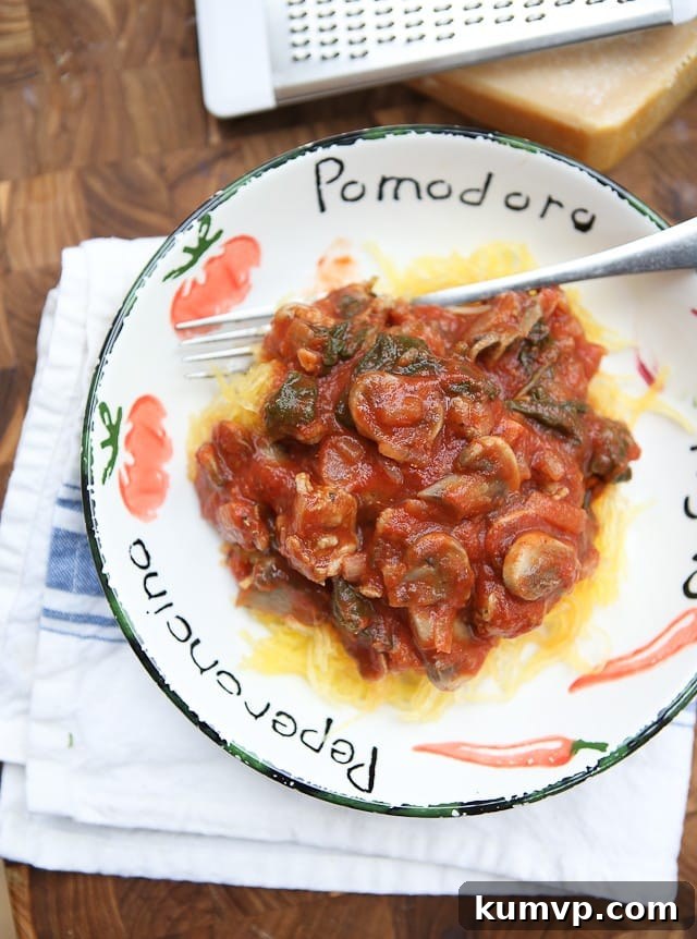 Spaghetti Squash with Sausage and Mushroom Bolognese Spaghetti Squash with Sausage and Mushroom Bolognese is a hearty low carb meal full of flavor!