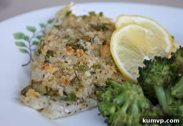 Zesty Oregano Baked Fish 4 breaded and herbed baked fish on plate with broccoli and lemon