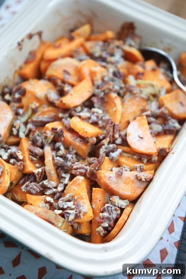 Individual serving of Savory Sweet Potato Gratin with Pecans on a plate.