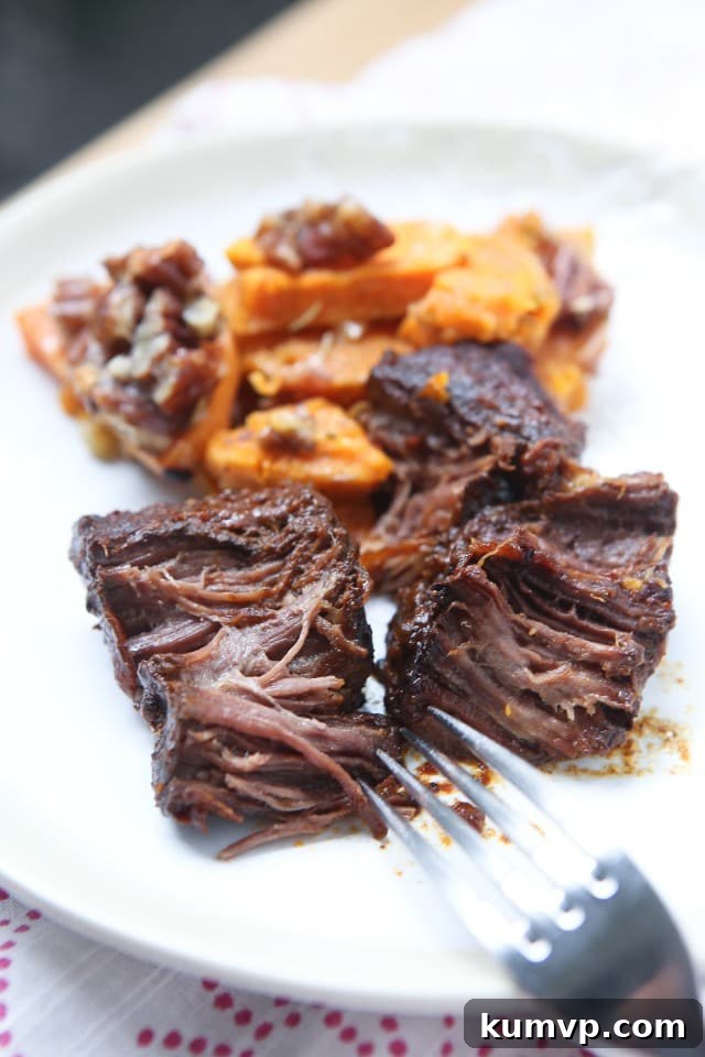 Tender Slow Cooker Barbecue Short Ribs Recipe - A perfect comfort food meal for family dinners or entertaining guests, yielding incredibly tender, fall-off-the-bone meat with rich barbecue flavor.