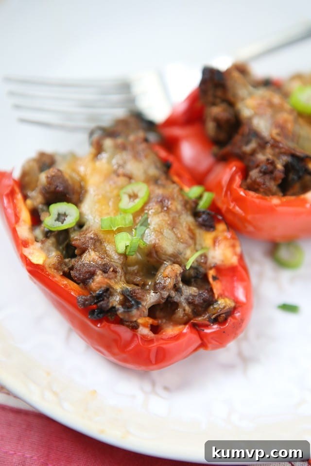 Simple and healthy, this low carb recipe for Beef and Spinach Stuffed Peppers were a hit at my house!