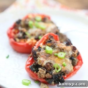 Simple and healthy, this low carb recipe for Beef and Spinach Stuffed Peppers were a hit at my house!