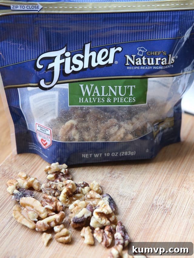 Wholesome and Delicious Ricotta Pasta Meal A close-up of Whole Wheat Pasta with Ricotta, Zucchini, and Walnuts, showcasing its creamy texture.