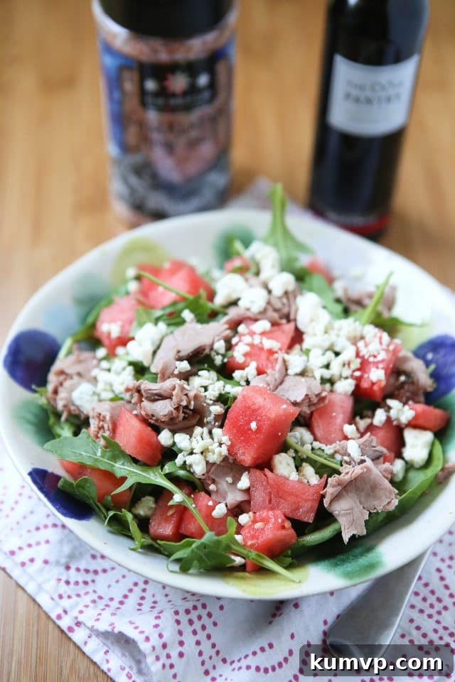 Experience the ultimate summer delight with this vibrant Spinach and Arugula Salad featuring juicy Watermelon and savory Roast Beef. A quick, healthy, and incredibly refreshing meal perfect for any occasion. Recipe inspired by aggieskitchen.com