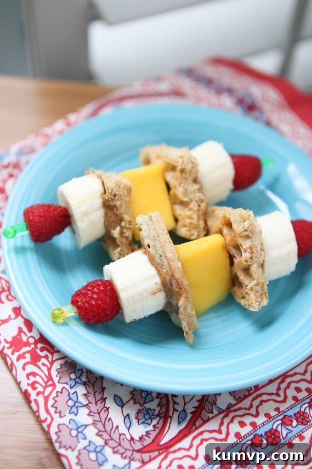 Fun breakfast idea for you and the kids! Breakfast Fruit Skewers (with whole grain waffles & nut butter) inspired by Produce for Kids.