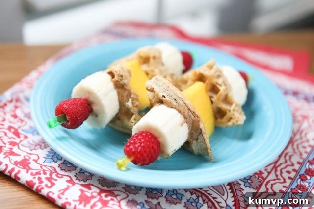 Fun breakfast idea for you and the kids! Breakfast Fruit Skewers (with whole grain waffles & nut butter) inspired by Produce for Kids.