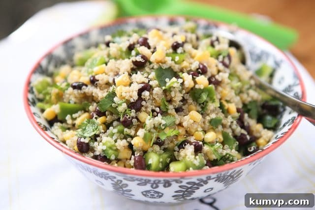 A bowl of Corn and Black Bean Quinoa Salad, showing its colorful ingredients and fresh appeal, ready to be enjoyed as a healthy lunch or dinner.
