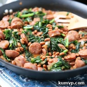 Easy comfort food your family will love! Baked Bean, Sausage & Kale Skillet - comes together fast, perfect for busy weeknights! Recipe via aggieskitchen.com