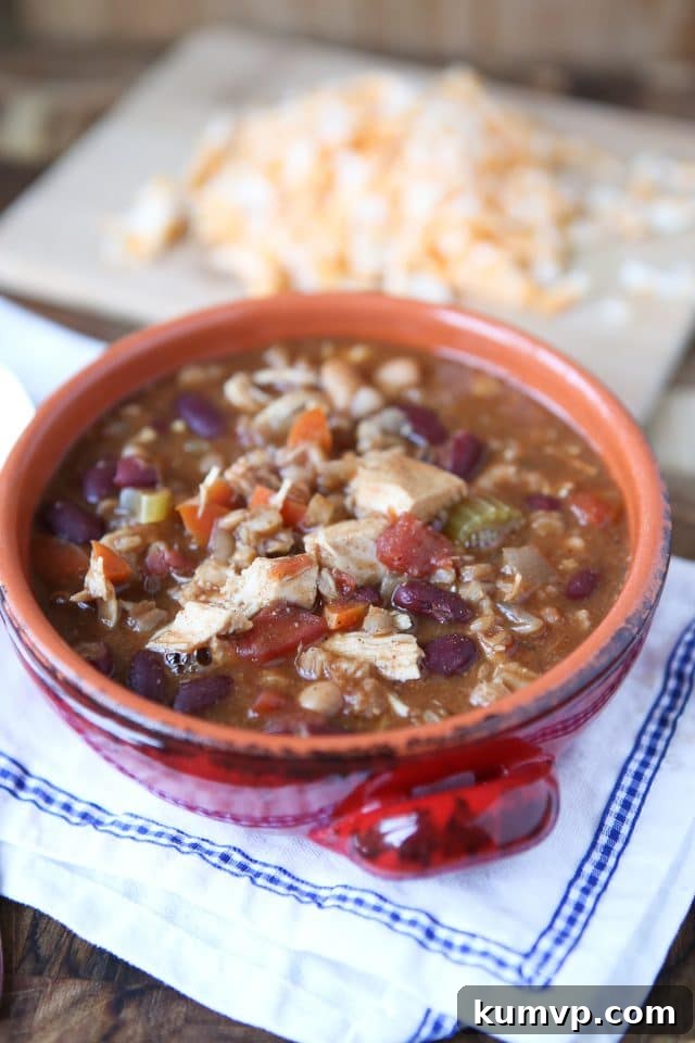 Warm up this winter with Slow Cooker Chicken and Farro Chili - so hearty & healthy, filled with veggies, lean protein, whole grains and Bush's Chili Beans. Recipe via aggieskitchen.com