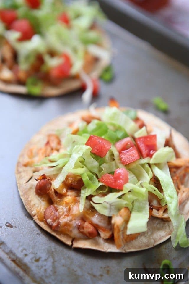 Flavorful Salsa Chicken and Bean Tostadas, a quick and easy Mexican-inspired dinner idea