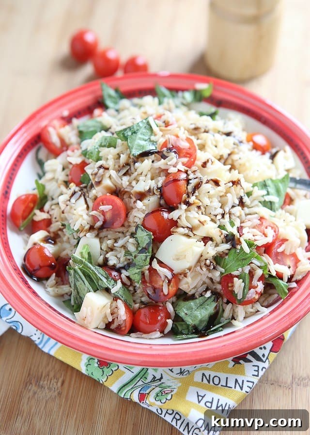 Fresh and vibrant Caprese Rice Salad, a delicious side dish bursting with Italian flavors