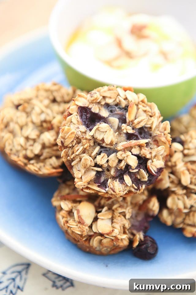 Healthy Blueberry Almond Oatmeal Bites, ideal for breakfast or a nutritious snack with yogurt