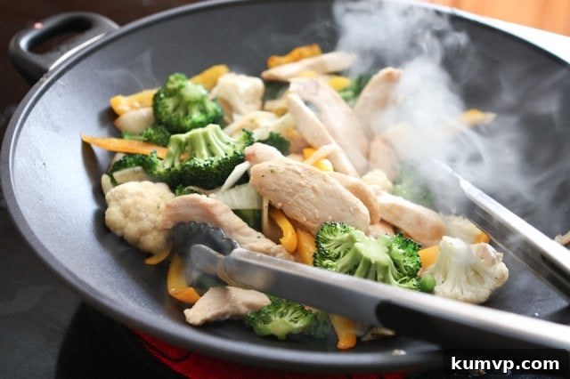 Simple Chicken and Vegetable Stir Fry, a versatile and quick dinner option for using up your favorite or leftover vegetables. Healthy and customizable.