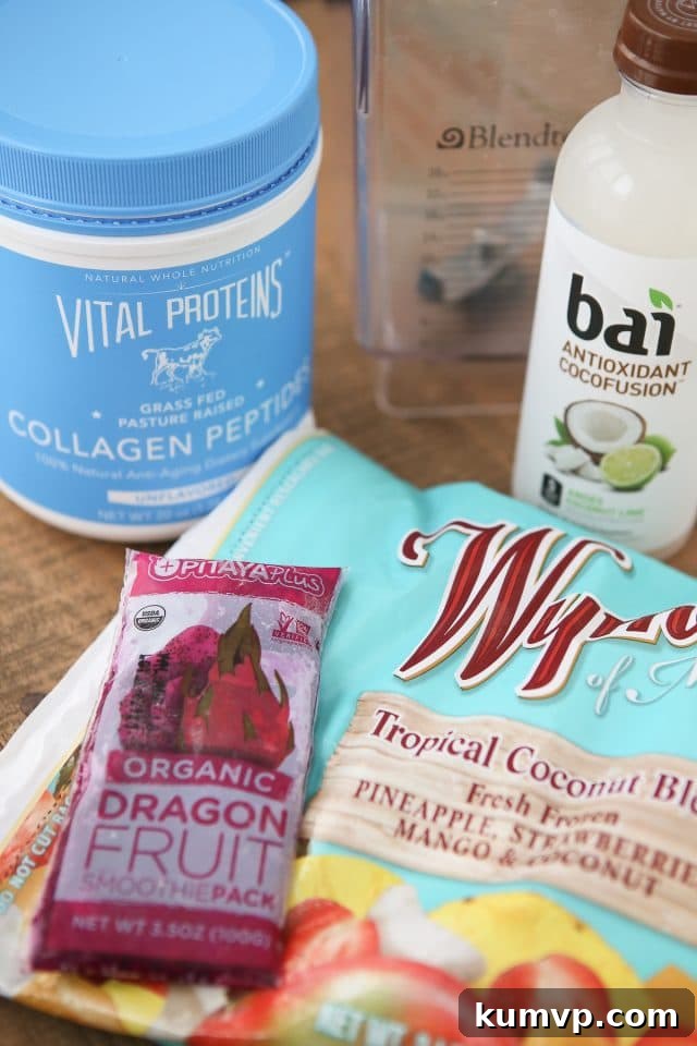 A second view of the vibrant pink Dragon Fruit Smoothie, emphasizing its refreshing texture and inviting color, suggesting a delicious and healthy treat.