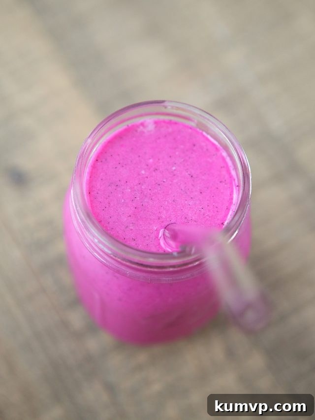 A third image of the Dragon Fruit Smoothie, showing the glass from a different angle, emphasizing its refreshing qualities and tropical allure for a healthy diet.
