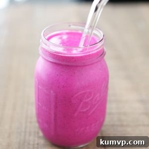 Finished Dragon Fruit Smoothie in a glass, ready to be enjoyed.