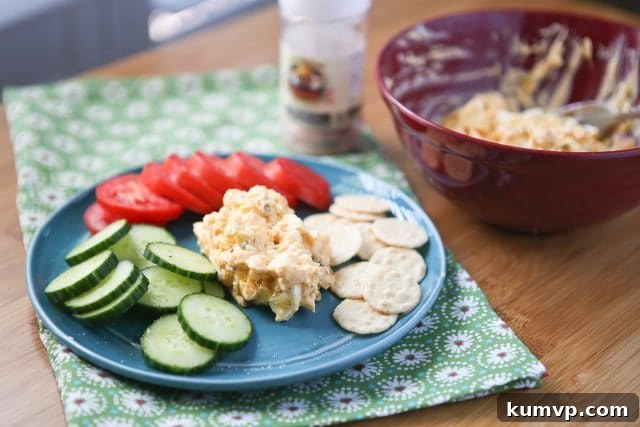 Close-up of Creamy Greek Yogurt Egg Salad with smoked paprika, garnished and ready to serve.