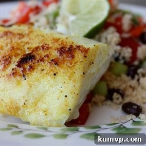 Close-up of Adobo Red Snapper with Confetti Couscous, showing vibrant colors and flaky fish texture.
