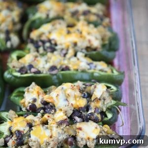 Only 5 ingredients to make these delicious Stuffed Poblano Peppers with Turkey and Black Beans! A light, healthy dinner perfect for weeknights. Leftovers make for great lunches too!