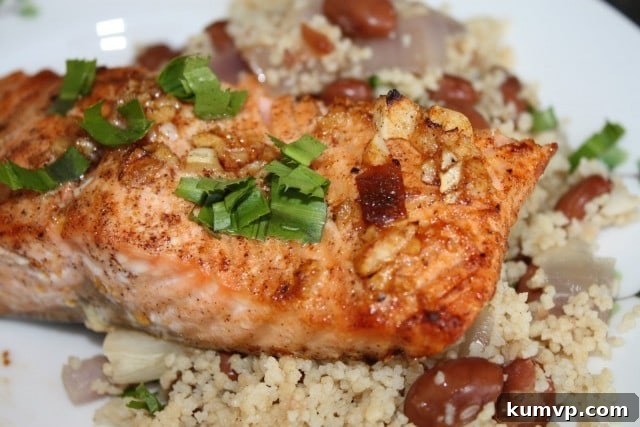 Arrangement of fresh ingredients including lime, chipotles, and salmon for the recipe