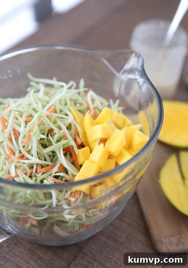 Tangy Mustard Broccoli Slaw Salad with Mango - The ultimate BBQ side dish