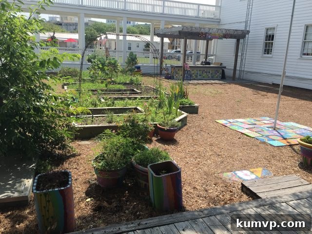 Seaside School: A Community Landmark The picturesque courtyard and garden of Seaside School, showcasing its unique architecture and inviting outdoor spaces for learning and community.