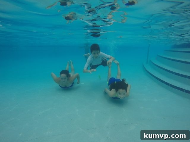 Family Beach Portrait: Happy Memories on 30A A beautiful family portrait on the beach, with everyone smiling and embracing the relaxed atmosphere of their 30A vacation.