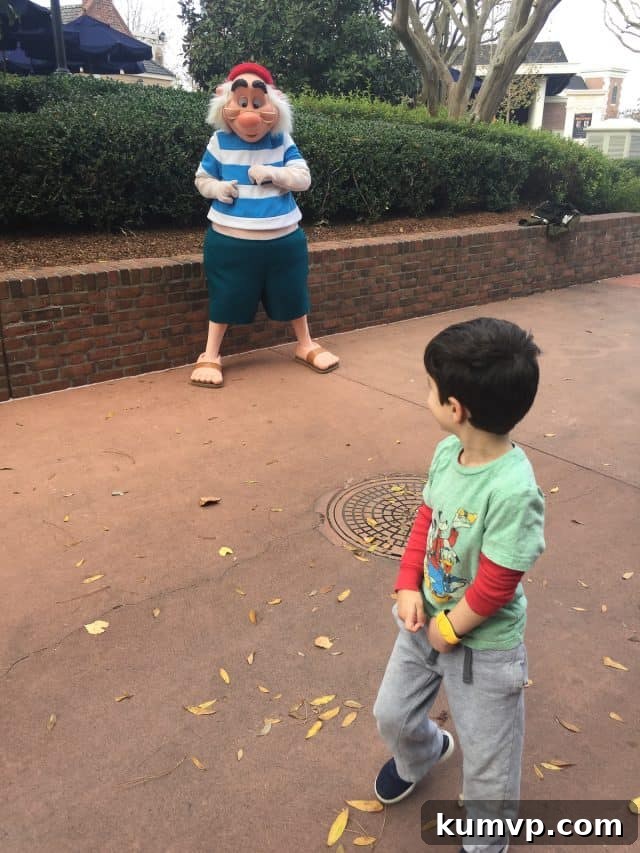Epcot Global Arts Celebration 2018 17 Child interacting with Epcot scenery