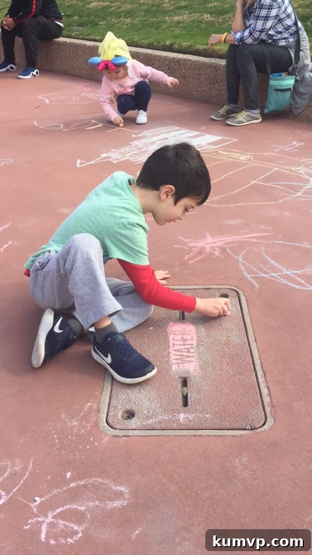 Epcot Global Arts Celebration 2018 10 More children enjoying chalk art at the festival