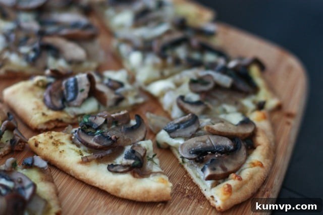Sun-Drenched Mediterranean Mushroom Bites 7 Grilled Portobello Mushroom Pesto Flatbreads, a flavorful vegetarian main course or hearty appetizer.