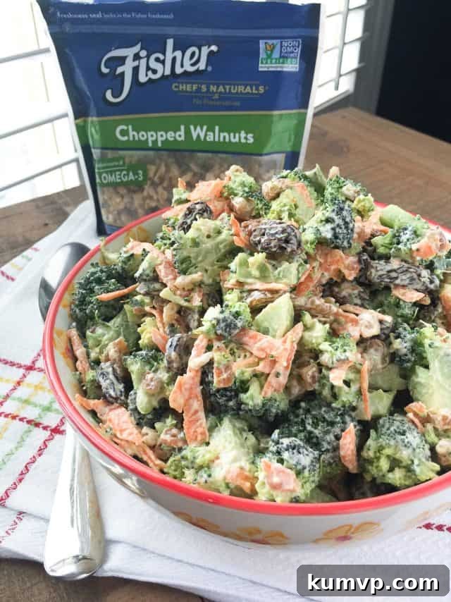 Broccoli Raisin Salad with walnuts in a serving bowl, ready for enjoyment. Broccoli Raisin Salad with walnuts in a serving bowl, ready for enjoyment.