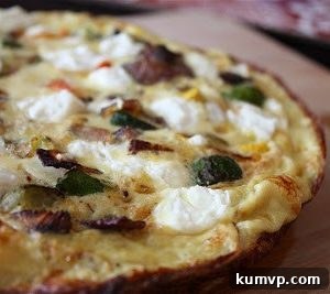 Vibrant Roasted Vegetable and Chevre Frittata 5 Delicious slice of Roasted Vegetable and Goat Cheese Frittata