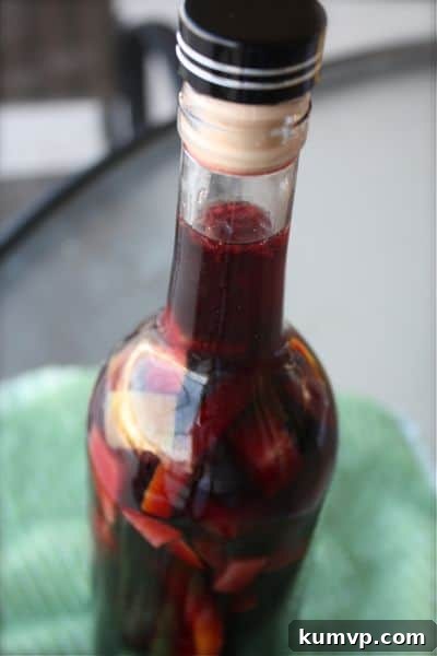 holiday sangria Holiday Sangria, a spiced wine cocktail perfect for the season, served in a glass with a festive garnish of fruit.