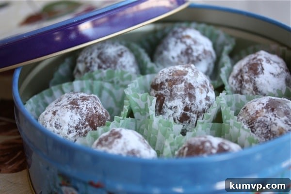 Delicious no-bake bourbon balls arranged on a festive holiday platter, ready to be served or gifted.