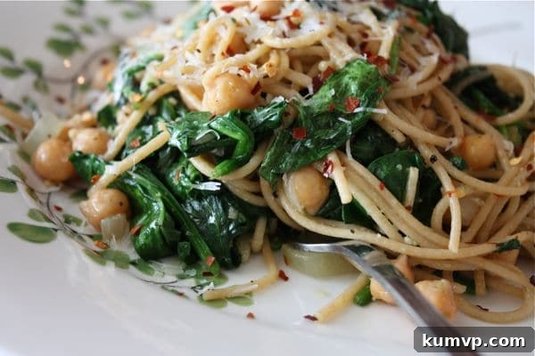 Whole Wheat Spaghetti with Sauteed Chickpeas and Spinach offers a hearty, healthy, and delicious vegetarian meal.