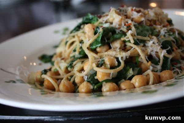 This hearty, healthy, and delicious vegetarian pasta dish features Whole Wheat Spaghetti with Sauteed Chickpeas and Spinach.