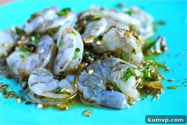 Crisp Butter Lettuce Cups: The Ideal Healthy Wrap Base A neatly arranged platter of fresh, crisp butter lettuce leaves, separated and perfectly cupped, ready to be filled with the delicious spicy shrimp and avocado mixture.