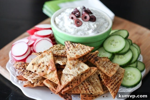 Effortless Easter Appetizers 3 A savory Kalamata Olive and Feta Dip with Lemon Pepper Pita Chips recipe – an excellent dip to serve with crisp, fresh vegetables and homemade pita chips.