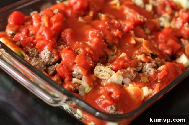 Stuffed Cabbage Casserole A baking dish filled with the rustic and hearty Stuffed Cabbage Casserole, ready to be served. This easy, healthy, and low-carb meal is a comforting alternative to traditional stuffed cabbage rolls.