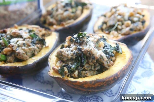 Perfectly Crafted Stuffed Acorn Squash with Sausage, Kale, and Walnuts Another perspective of Stuffed Acorn Squash, showcasing its appealing texture and hearty ingredients before the final bake.