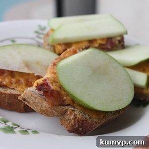 A perfectly cooked Bacon, Apple, Cheddar Melt ready for serving.