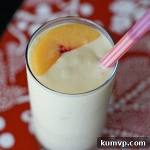 Fruity Greek Yogurt Smoothie in a glass with straw