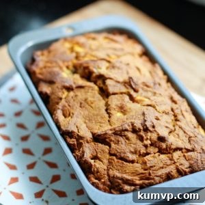 Spiced Autumn Apple Pumpkin Loaf 2 Miniature image of a freshly baked Apple Pumpkin Bread slice