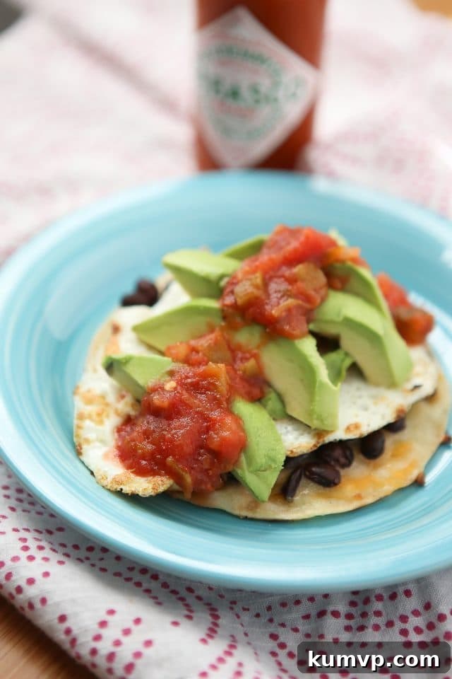 Change up your egg and toast breakfast (or dinner) routine with these simple and healthy Black Bean and Egg Tostadas - comes together in just minutes with just a few staple ingredients. Recipe via aggieskitchen.com